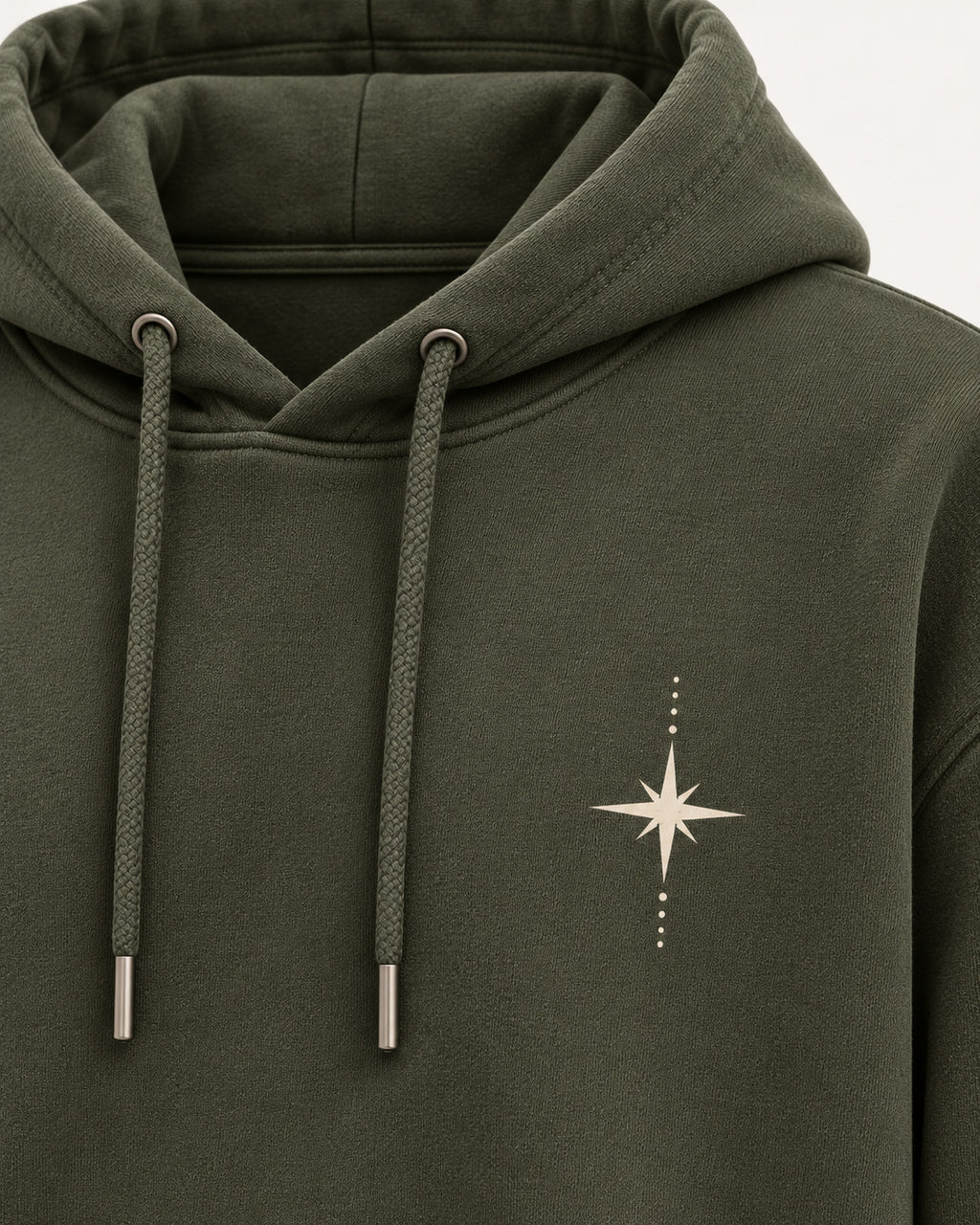 Closeup olive hoodie compass star chest graphic