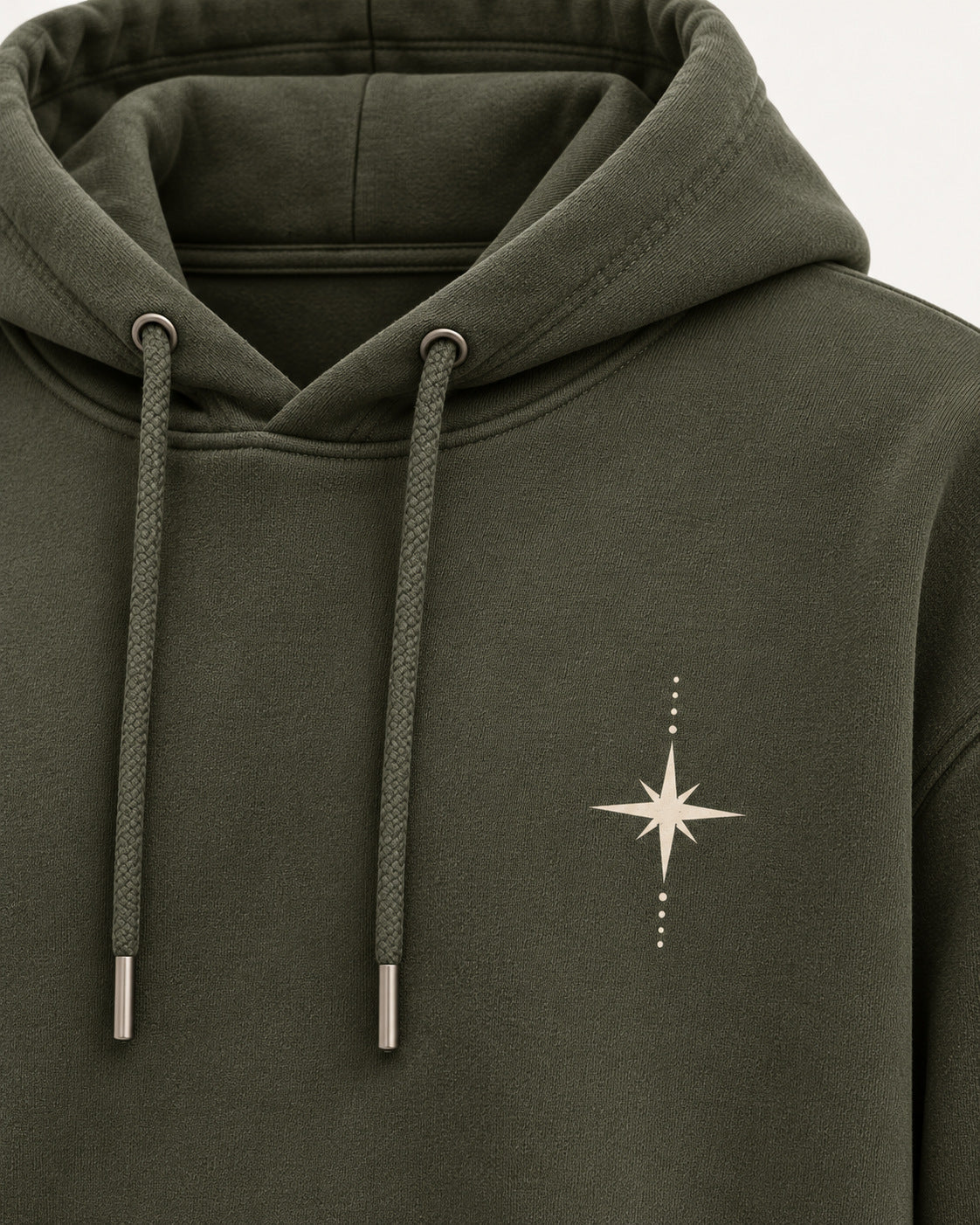 Closeup olive hoodie compass star chest graphic