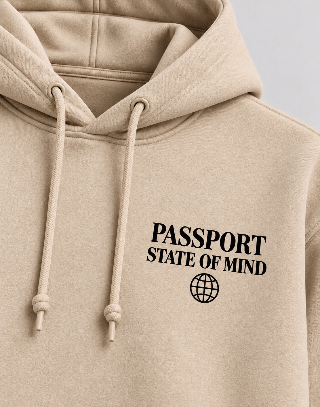 Close-up of Passport State of Mind black chest graphic and globe
